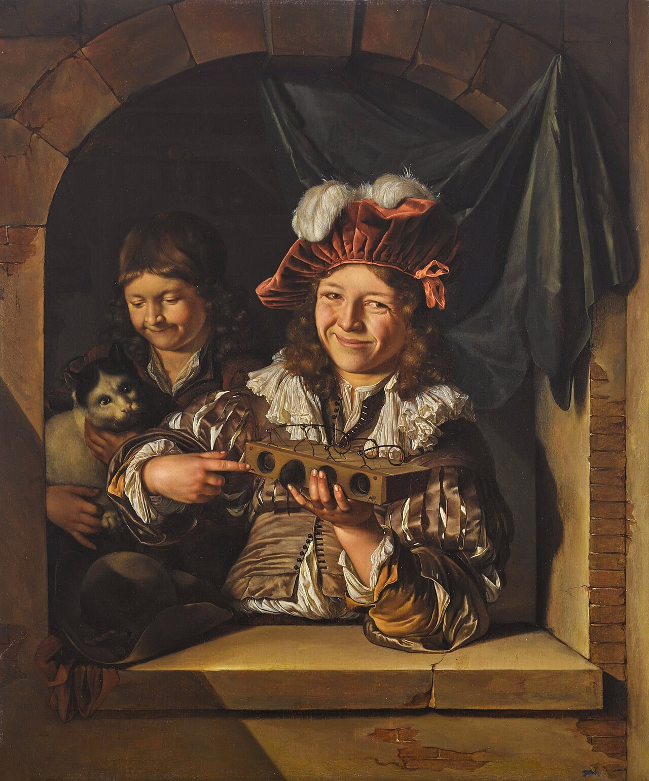 Two boys with a mouse trap and a cat at a window by Eglon van der Neer
