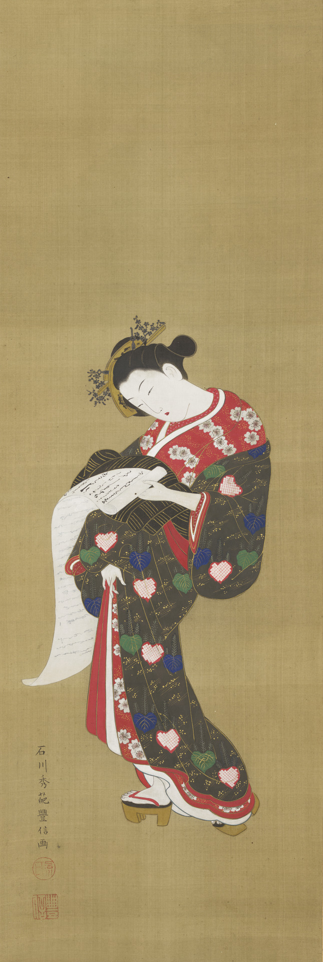 Young woman reading a scroll by Ishikawa Toyonobu